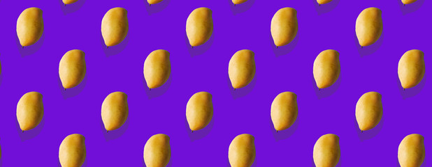 Seamless Pattern made with mango fruit on purple background.