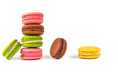 colored macaroons on a white background
