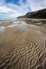 Lםw tide on beach in New Zealand