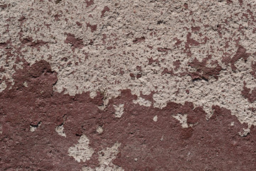 Texture background - concrete covered with old peeling paint. Grunge texture surface with brown peeling paint.