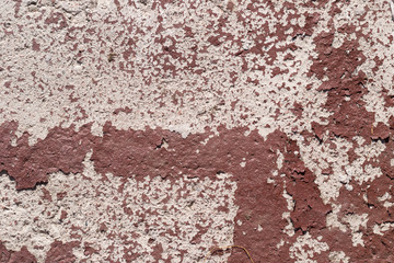 Texture background - concrete covered with old peeling paint. Grunge texture surface with brown peeling paint.