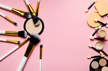Flat lay composition with set of professional makeup brushes , bright, cosmetic, sponges, piink, background, beauty, powder,facial,soft,big,care