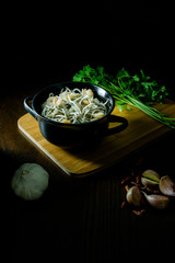 Cacerola de Gulas con gambas, ajo, perejil y guindillas, dark photography