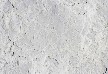 abstract texture of coastal white stone for background, close-up
