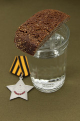 Funeral speech. Soviet Orders with bread and glass