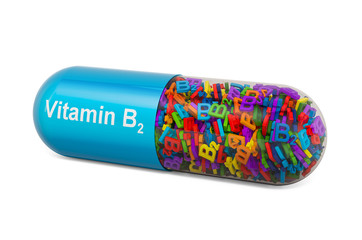 Vitamin capsule B2, riboflavin. 3D rendering