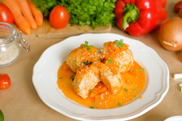 meatballs in orange sauce top view. Meatballs with vegetables. Russian kitchen