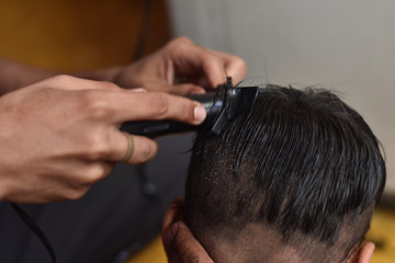 after corona virus lockdown every people in quarantine so man cut a boy hair at home with trimmer 