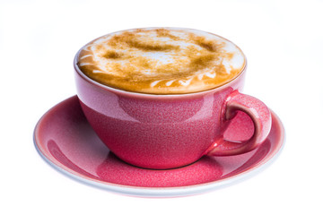 Hot cappuccino topped brown sugar cane, ceramic coffee cup isolated on white background