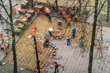 Road workers dismantled tile pavement