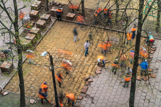Road workers dismantled tile pavement