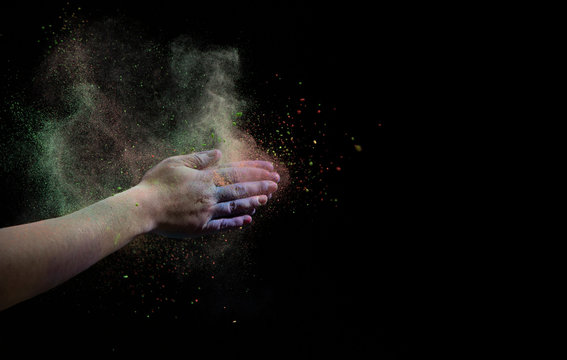 Hands Clap, Around Cloud Of Multicolored Powder