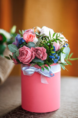 Obraz na płótnie Canvas Basket of roses. festive bouquet of pink flowers. flower shop, picture, postcard.