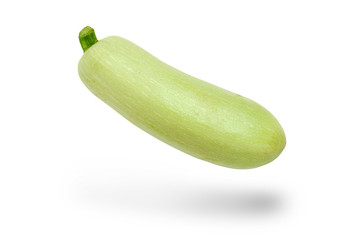 Ripe zucchini on a white background. Levitation. Isolated.