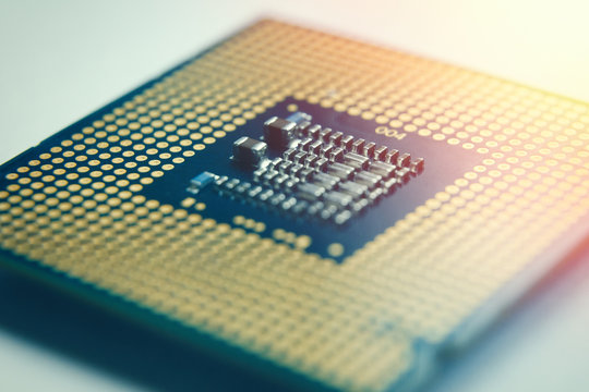 Close-up CPU - Central processing unit microchi. Selective focus and lens flare - Powered by Adobe