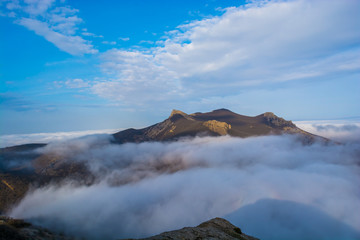 Fototapeta na wymiar Mountains in the fog