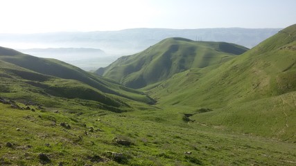 Obraz premium mountain landscape with green grass