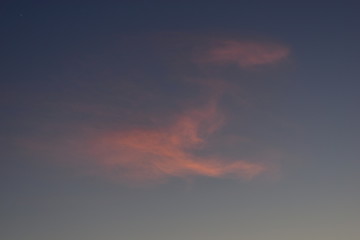 Evening blue yellow sunset horizon with clouds