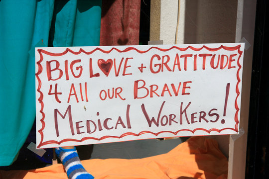 Sign in a store window in Tucson AZ during the Covid-19 epidemic - "Big Love 4 all our Brave Medical Workers!"