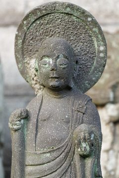 Close-up of Kṣitigarbha, a bodhisattva primarily revered in East Asian Buddhism and usually depicted as a Buddhist monk.