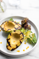 Grilled Avocado with Lettuce and Spicy Sauce