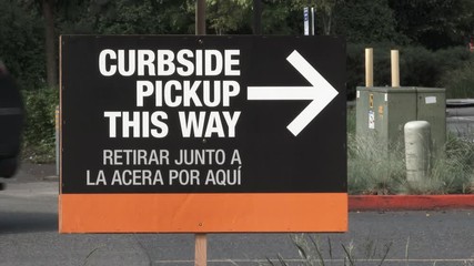 Curbside Pickup This Way Sign And Traffic