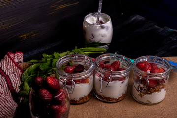 Delicious strawberry muesli with yogurt for breakfast