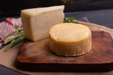 Delicious cheese in a wheel ready to eat or enjoy in an afternoon with friends