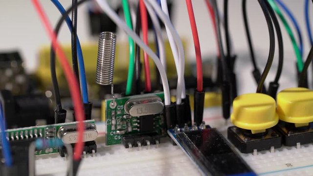 Breadboard prototyping with microcontroller arduino components and wire jumpers