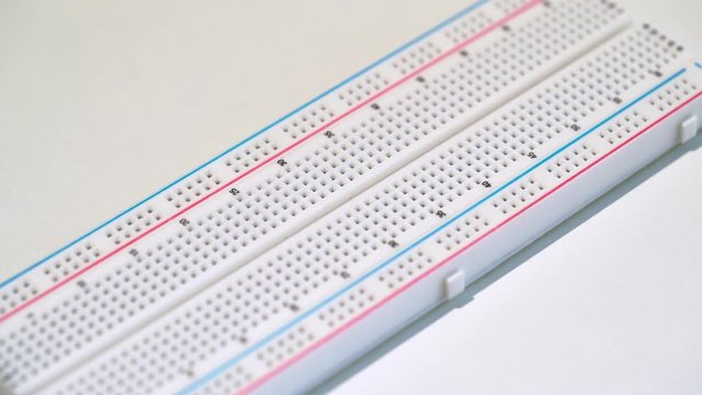 Breadboard electronics equipment mockup plate. DIY project arduino programming
