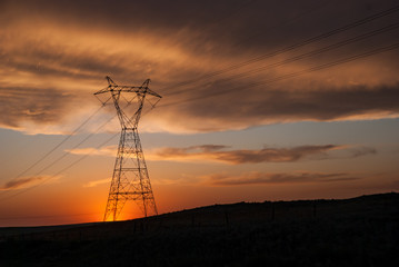 Power Lines on Power Tower at Sunset in the Midwest	