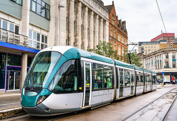 Fototapeta na wymiar City tram at Old Market Square in Nottingham, England