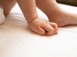 baby feet in bed