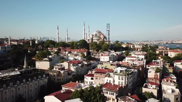 Sultan Ahmet Camii aka Blue Mosque, Istanbul Turkey. Drone Aerial View of Landmark and Neighborhood on Golden Hour Sunlight