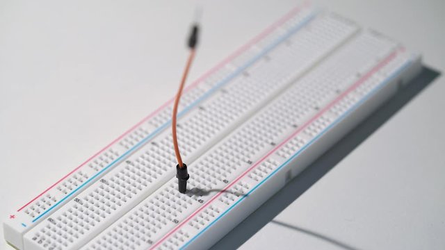 Breadboard electronics equipment mockup plate. DIY project arduino programming