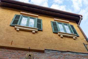 Italian style wooden faces, colorful Italian-style architecture.