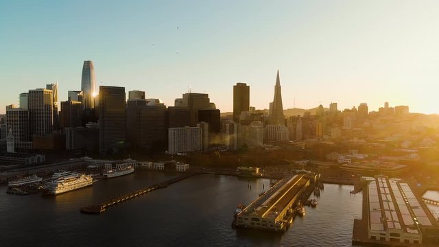 San Francisco Skyline and waterfront in Golden Light at Sunset, aerial