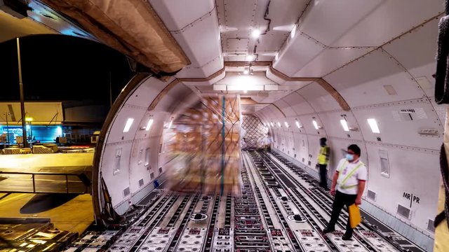 Loading air cargo freighter inside aircraft cargo hold loop