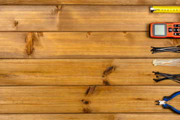 Set of hand repair tools on a wooden background with copy space. Do it yourself (DIY) concept. Top view
