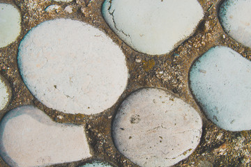 Pebbles on the pavement close-up