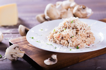risotto with mushrooms, fresh herbs and parmesan cheese. Tasty and healthy vegetarian lunch