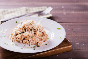 risotto with mushrooms, fresh herbs and parmesan cheese. Tasty and healthy vegetarian lunch