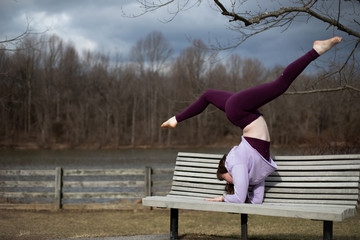 Girl doing yoga in nature 