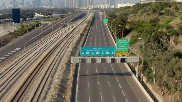 No cars on Ayalon Freeway due to Coronavirus Lockdown in central Tel Aviv, Israel, aerial drone still shot