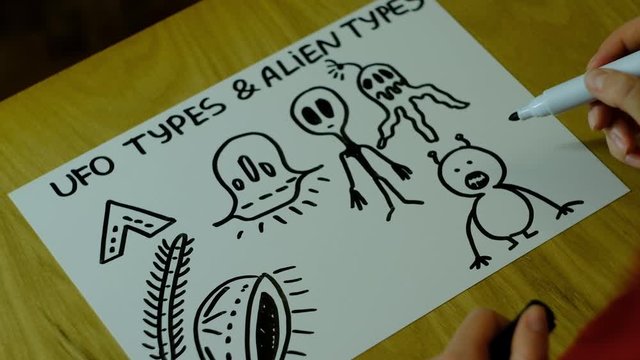 image on paper of different space creatures and UFOs