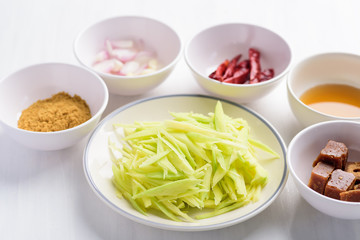 Thai food ingredients, spicy green mango salad (Tum Ma Muang)