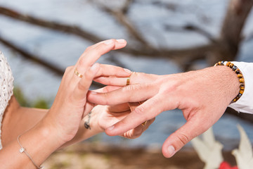 Wedding engagement rings in hands