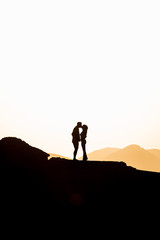Fototapeta premium Couple in love hugging in the sunset. Wedding in Majorca by the sea.