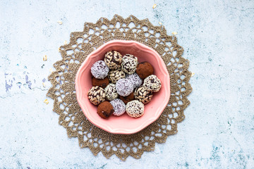 Sweet chocolate coconut truffles balls. Vegan healthy dessert.