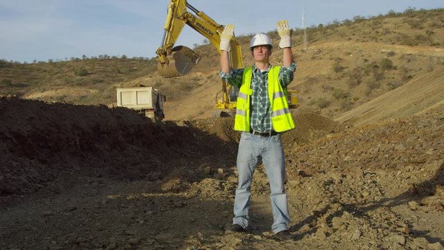 WS Construction worker guiding vehicle